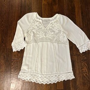 Beautiful white lace tunic top. Tag says medium,  it could also fit a small.